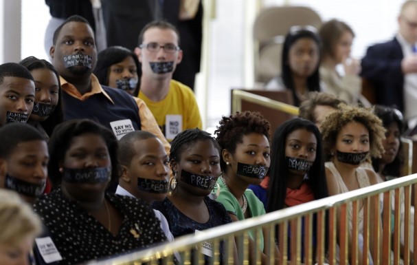 Members of North Carolina student chapters of the NAACP. Photo credit: Geery Broome/Associated Press)